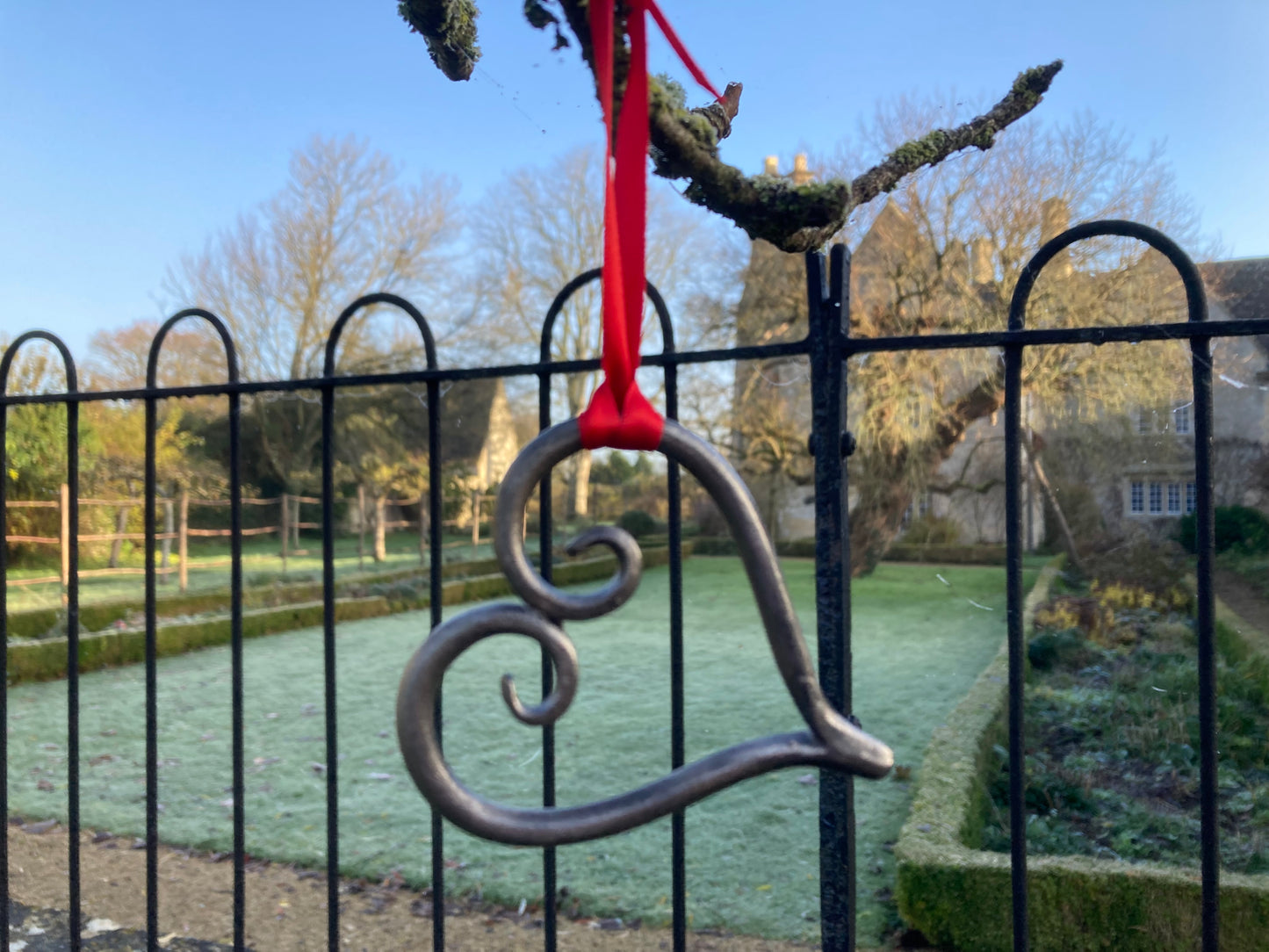 Blacksmith made hanging heart ornament