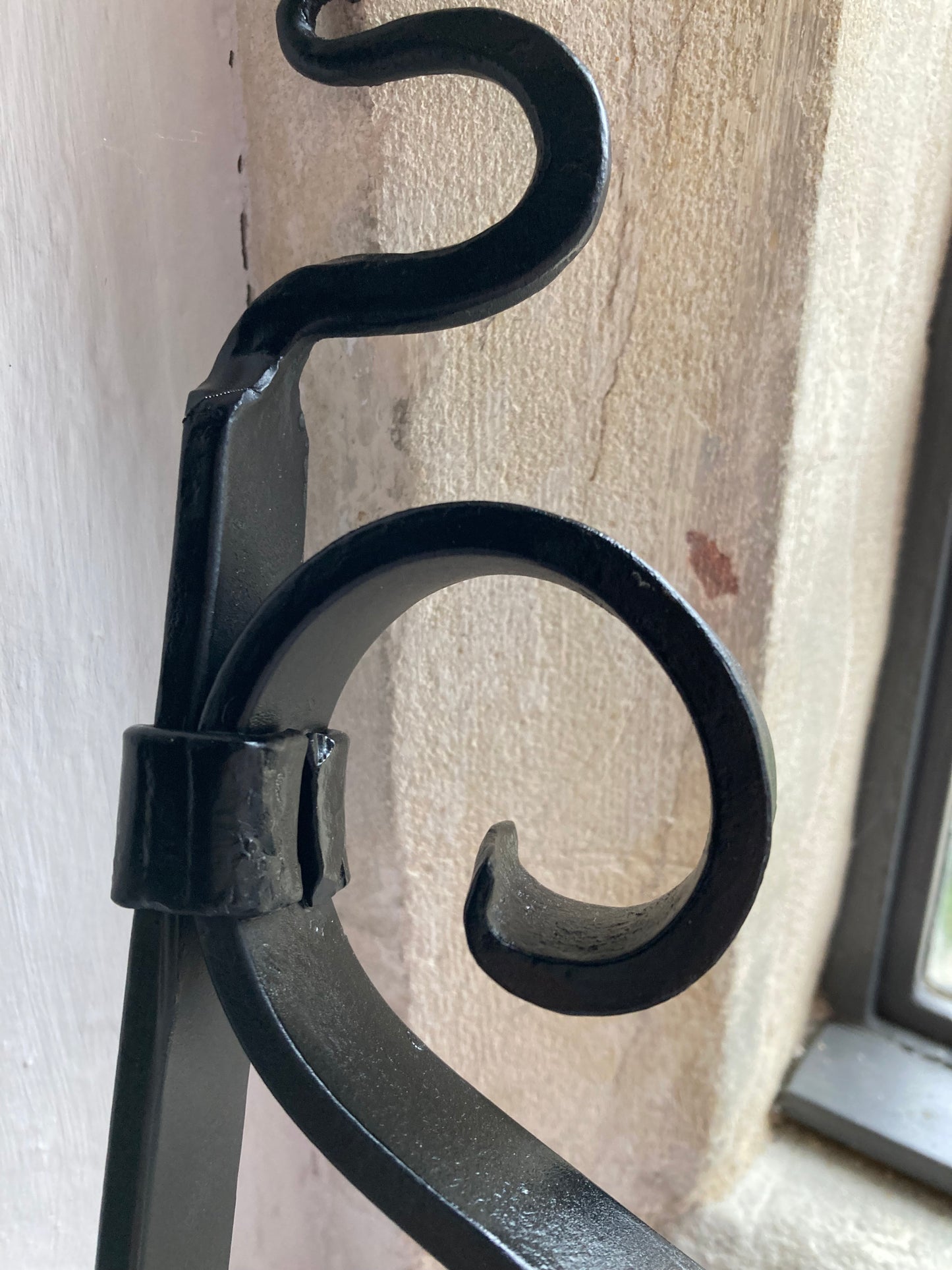Blacksmith made hanging bracket