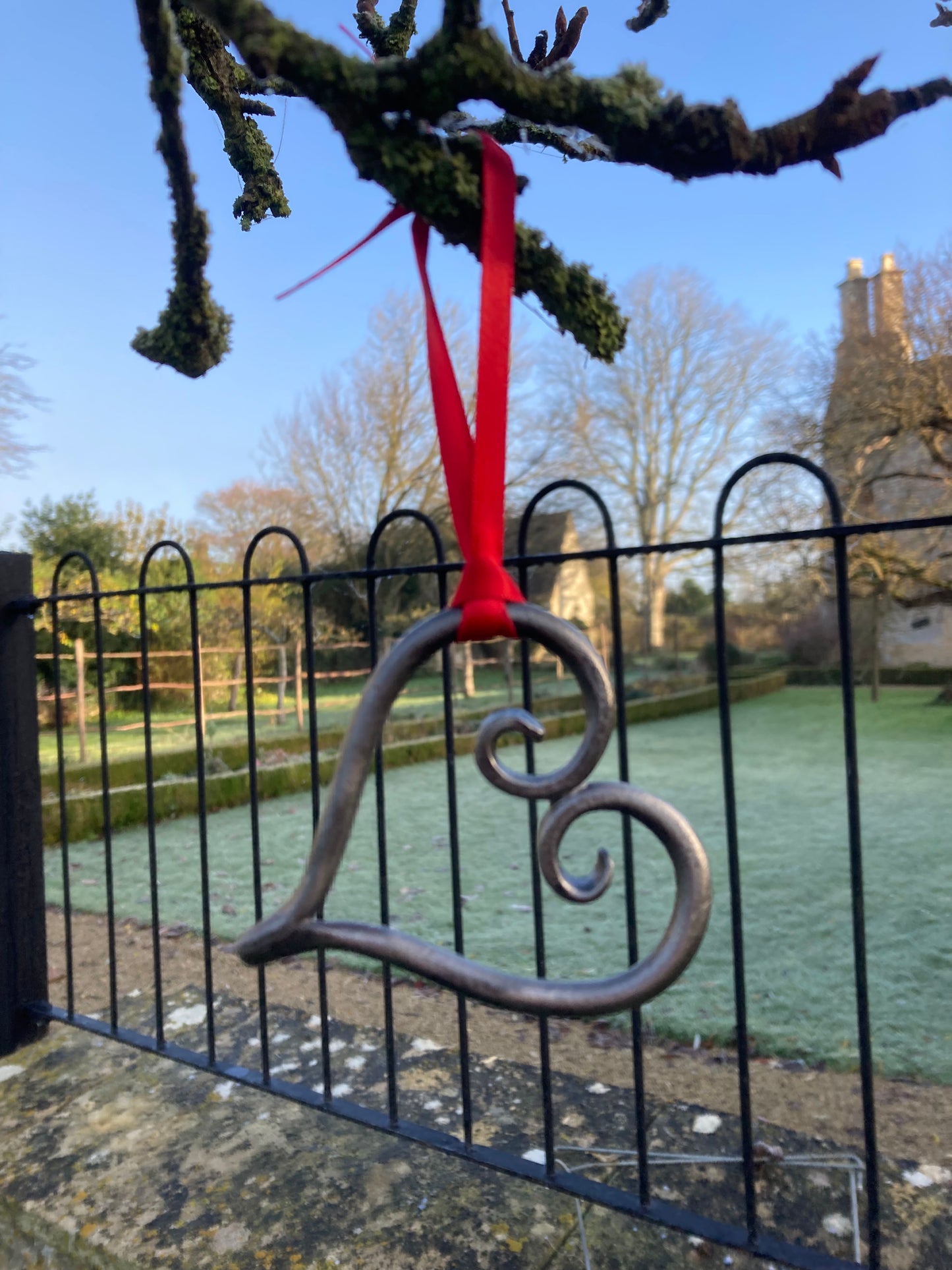 Blacksmith made hanging heart ornament