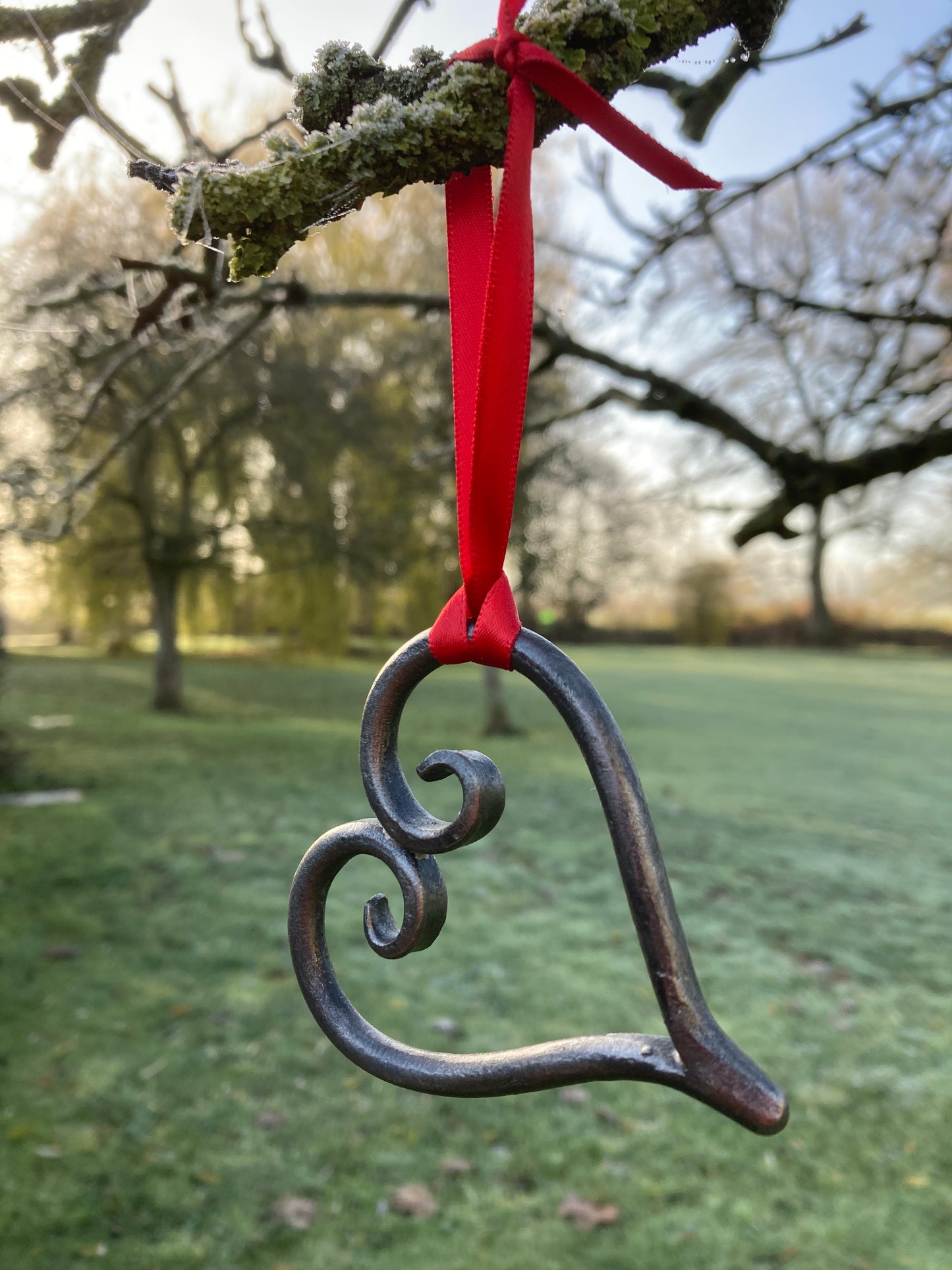 Blacksmith made hanging heart ornament