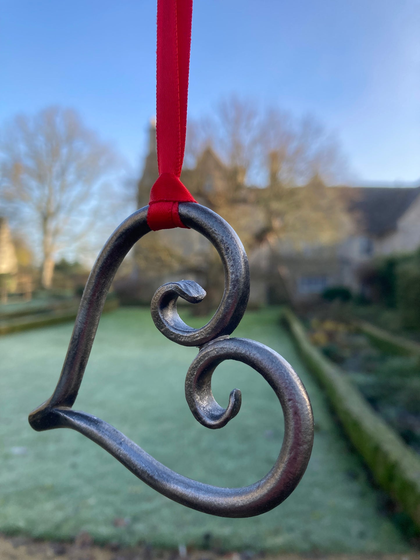 Blacksmith made hanging heart ornament