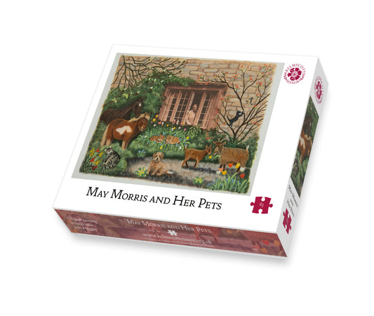 63 piece jigsaw of May Morris and her pets