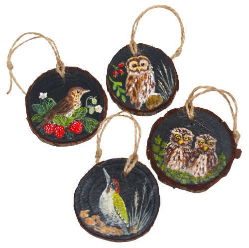 Four hand painted wood slices